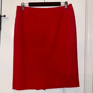 Anne Klein red skirt size 6. Zips in back, falls at knee. Red.